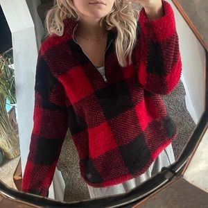 Red and black “flannel” fuzzy quarter zip
